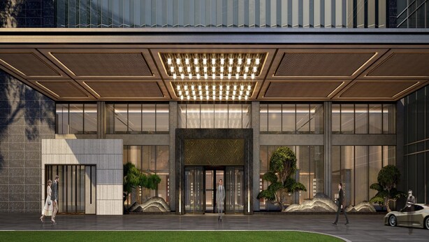 A modern building with a glass facade, a covered entrance, and a landscaped area with trees. - Hualuxe Guiyang Financial City (Guiyang)