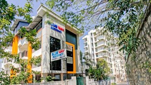 A modern building with a sign for 'Blue Way Residency Hotel.' - Blueway Residency BusinessBoutique Hotel (Thiruvananthapuram)