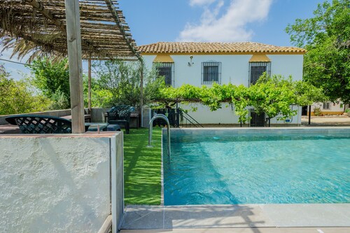 Villa 'Rancho Jardines De Marchenilla' with Private Pool, Wi-Fi and Air Conditioning