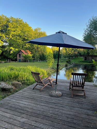 Glamping tent on a country house estate with pond and stream