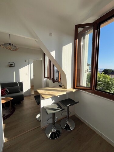 Apartment T1bis with private parking