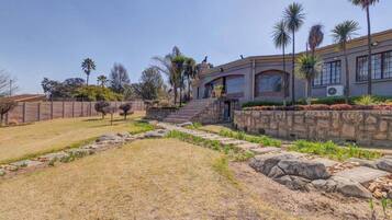 House, 4 Bedrooms, Patio | Property grounds