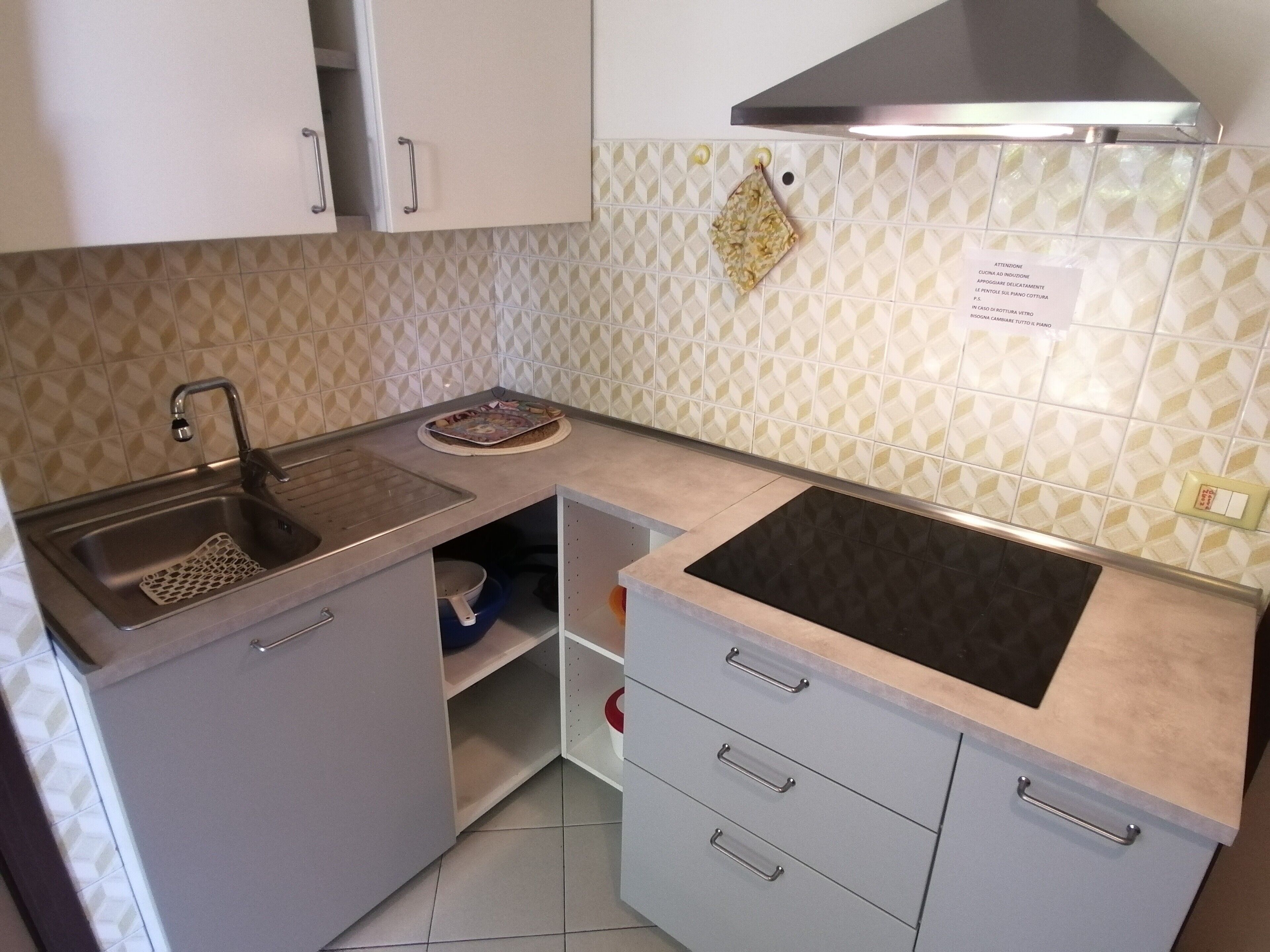 Fridge, stovetop, coffee/tea maker, cookware/dishes/utensils