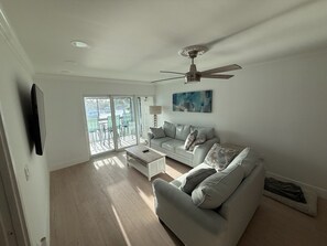 Living area - Fully Furnished Waterfront Condo with Bay Views -Extended Stay Preferred (Apollo Beach)