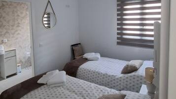 3 dormitorios, tabla de planchar con plancha, wifi y ropa de cama