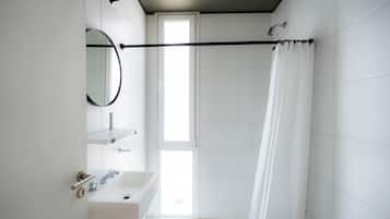 Shower, towels, toilet paper
