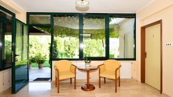 Villa (Three bedroom Villa with pool) | Living room | 32-inch flat-screen TV with satellite channels