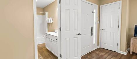 Shower, hair dryer, towels, shampoo