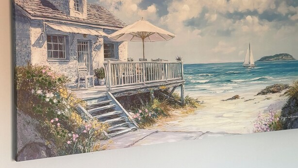 A seaside painting with a house, pier, and sailboat. - Modern 2BR 5minutes walk Anfeild| Free parking+ Ev (Liverpool)