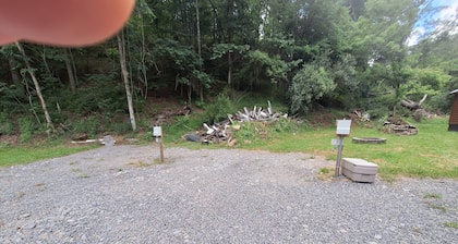 Tremendous camp site in Glenville perfect for outdoor .55 acres of woods. W