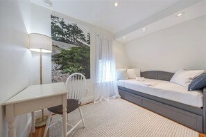 2 bedrooms, desk, iron/ironing board, travel cot