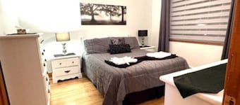 Cozy 3BR Getaway with Backyard & Included parking