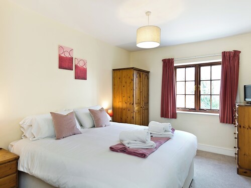 Attractive barn conversion set in three acres of shared grounds.
