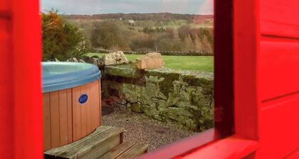 Quirky accommodation with splendid four poster bed and private hot tub.