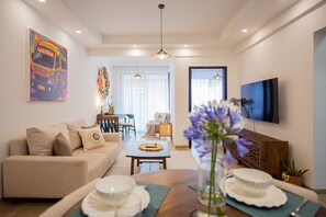 Superior-Apartment, Stadtblick | Wohnbereich