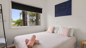 Iron/ironing board, travel crib, free WiFi, bed sheets