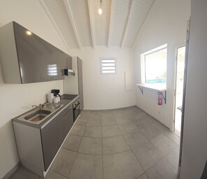 Private kitchen - Treat yourself to a relaxing stay in this charming, bright T2 apartment with private pool. (Sainte-Anne)