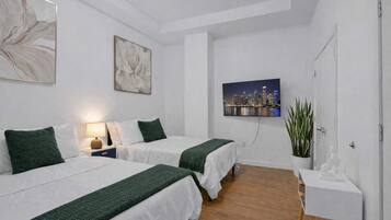 1 dormitorio, tabla de planchar con plancha, cuna de viaje y wifi