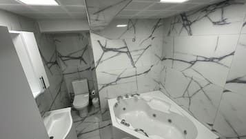 Shower, slippers, towels, soap