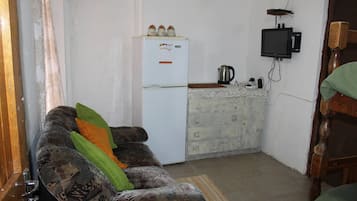 Quarto, vários quartos, acessível, para fumantes | Sala de estar