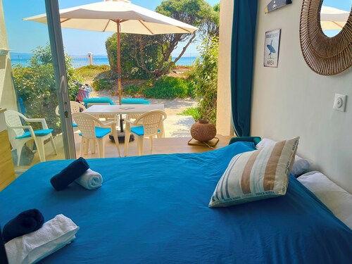 Air-conditioned studio right on the water at La Bergerie Beach, across from Porquerolles