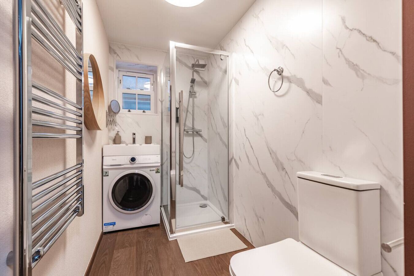 Shower, hair dryer, towels, shampoo