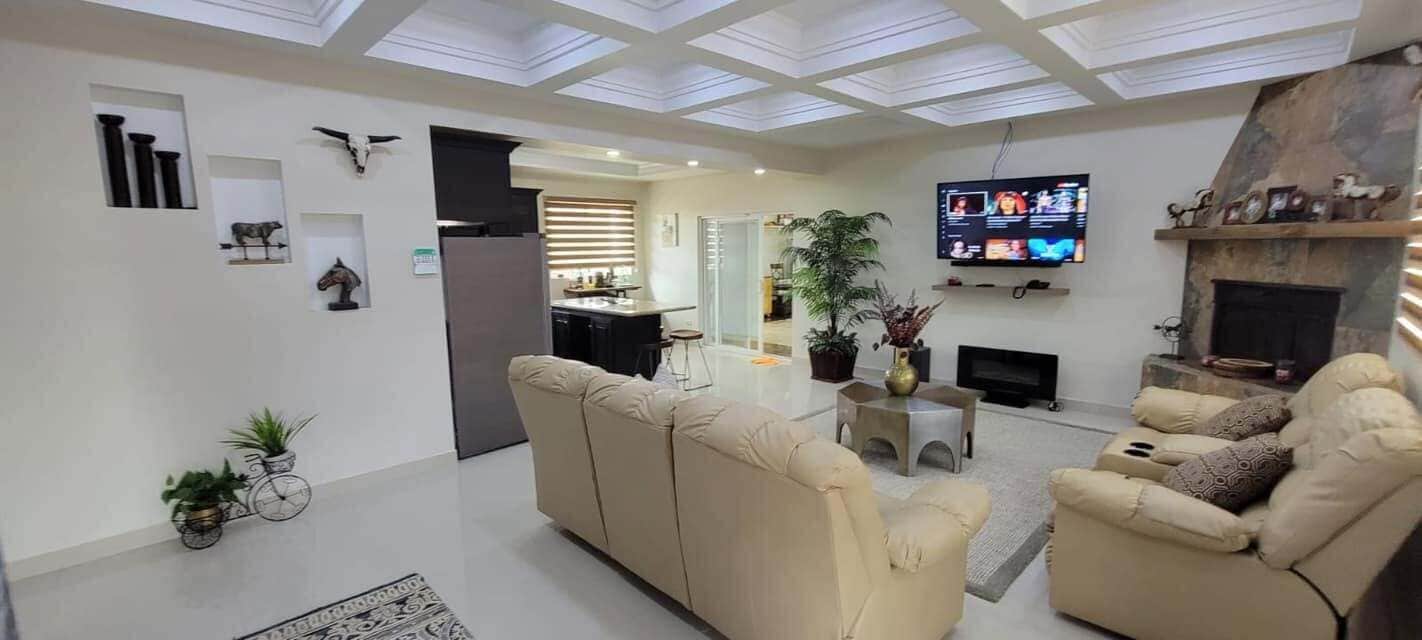 Casa Confort, vista al patio | Área de sala de estar
