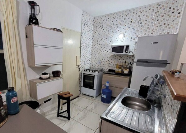 Family House, 3 Bedrooms | Private kitchen - Casa em Ilha Comprida - Casa (Ilha Comprida)