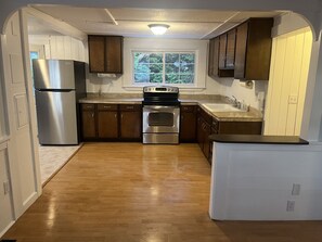 Private kitchen - 2 BR Cottage less than 1/2 mile to Sea Street and Glendon Beaches.  AC and Yard (Dennis)