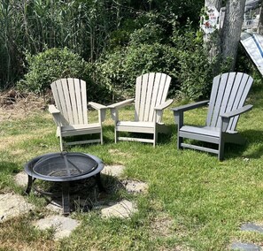 Property grounds - 2 BR Cottage less than 1/2 mile to Sea Street and Glendon Beaches.  AC and Yard (Dennis)