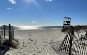 A beach path leading to the ocean with a lifeguard tower on the right. - 2 BR Cottage less than 1/2 mile to Sea Street and Glendon Beaches.  AC and Yard (Dennis)