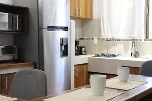 Familiehus - balkon - udsigt til have | Privat køkken