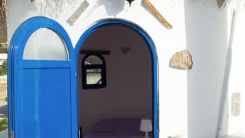 Chambre Triple Deluxe, vue jardin | Fer et planche à repasser, Wi-Fi gratuit