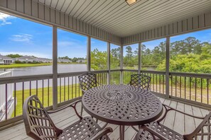 Outdoor dining - New Bern Condo-Resort Living with Pool, Gym, & Water Views (New Bern)
