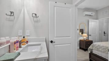 Shower, hair dryer, shampoo