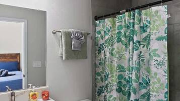 Shower, hair dryer, shampoo