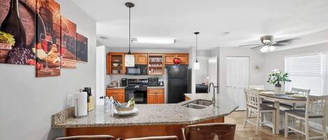 Coffee/tea maker, fridge, microwave, oven