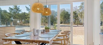 Modern holiday near fjord and beach