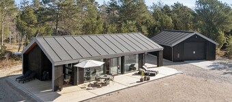Modern holiday near fjord and beach