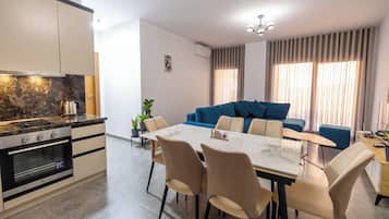 Deluxe Apartment, Balcony | Private kitchen