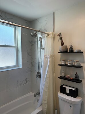 Hair dryer, towels, soap, toilet paper