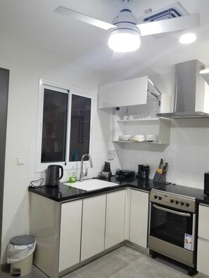 Private kitchen - Escape to Eden heights,a 2 bedroom Apt with Gym access near the West Hills Mall. (Weija, Accra)