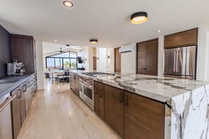 Fridge, stovetop, cookware/dishes/utensils, spices - Pedregal Villa w Pool Jacuzzi Pizza Oven Walk to Beach (Cabo San Lucas)