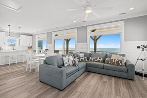 Smart TV, fireplace, books - Reel Paradise: Oceanfront 4BR retreat in Oak Island, perfect for family fun! (Oak Island)
