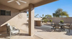 Outdoor dining - Enjoy Pebble Creek living: Cozy 2BR In Arizona's Premier 55+ Community. (Goodyear)