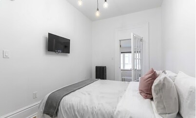Bright & Comfortable 2BR Apartment | On-Site Parking