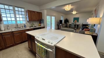 Coffee/tea maker, fridge, microwave, oven