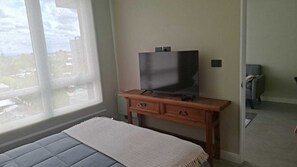 1 slaapkamer, een strijkplank/strijkijzer, wifi, beddengoed