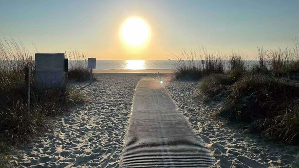 A beach path leading to the ocean with a wooden boardwalk. - New to VRBO, Oceanwalk, Near Beach, Outdoor and Indoor Pool, Hot Tub (Hilton Head Island)