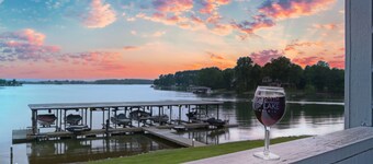 Sunset Cove - Waterways lakefront retreat with boat slip, pool & beach - dogs OK
